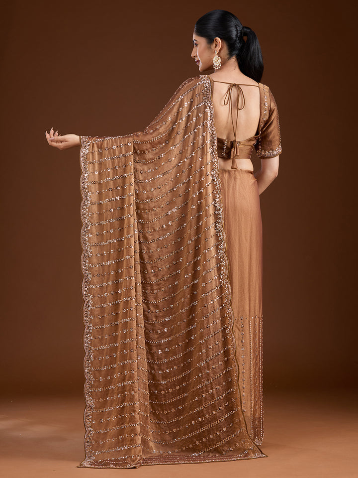 Uma sutra tissue saree back view 