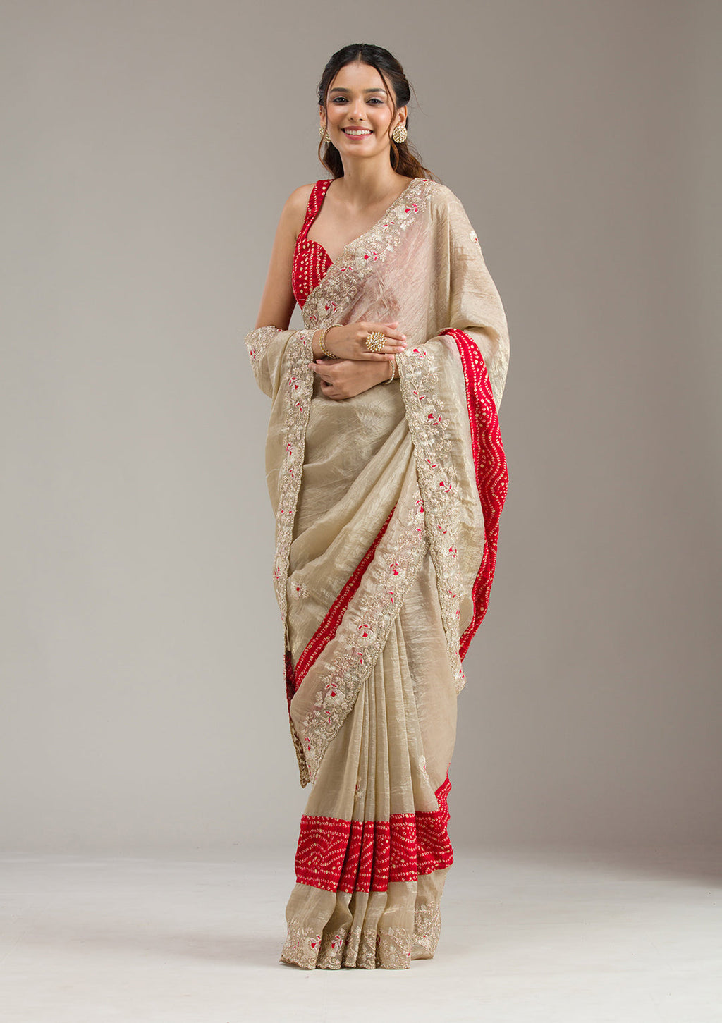 Uma Sutra tissue saree beige 
